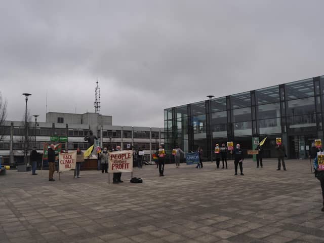 Protestors in Believe Square on United Nations' Anti-Racism Day