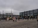 Protestors in Believe Square on United Nations' Anti-Racism Day