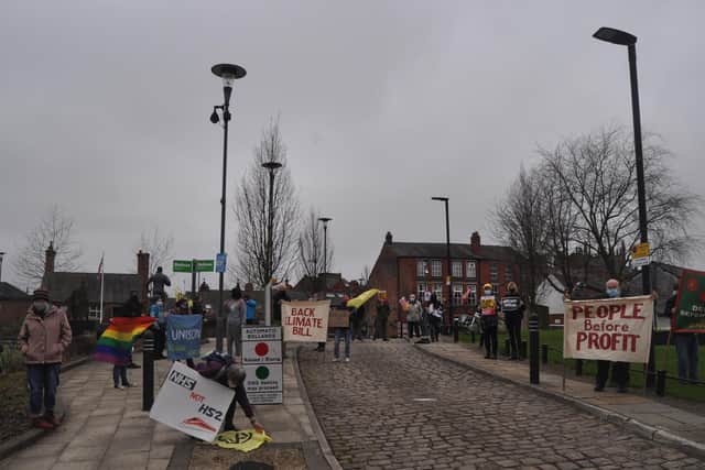 Protestors gather in Wigan town centre on Saturday
