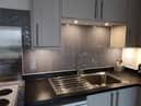 A thrifty mum has revamped her whole kitchen for just £55