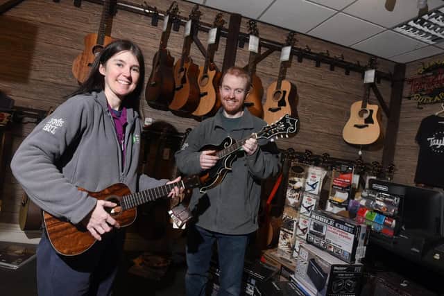 Michelle and David Bamford owners of Symphony Music, Market Street, Wigan