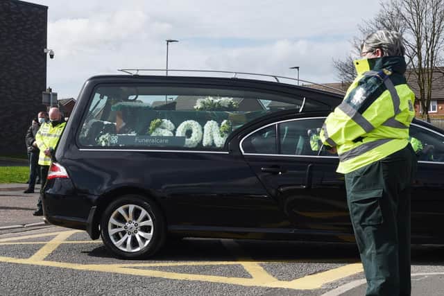 Floral tributes from family and friends in the hearse