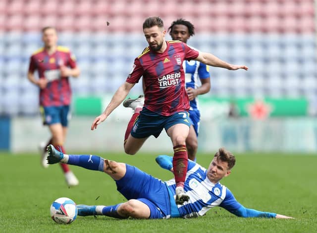 Lee Evans in action against Ipswich - his first appearance at the DW since last October