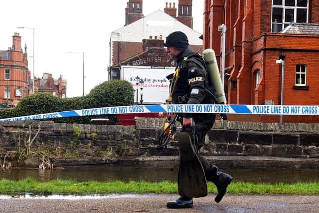 A police diver at the scene in Leigh