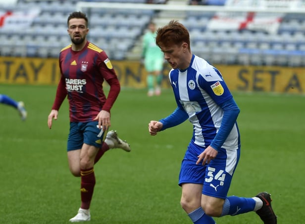 Luke Robinson in action for Latics against Ipswich