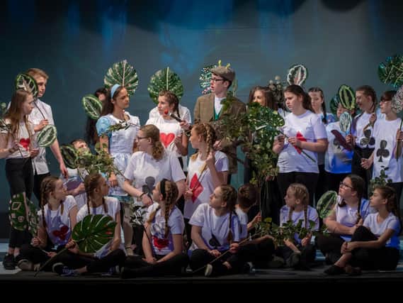 Cast members of the WLT youth group's production of Alice in Wonderland which had to be pulled just before its run began