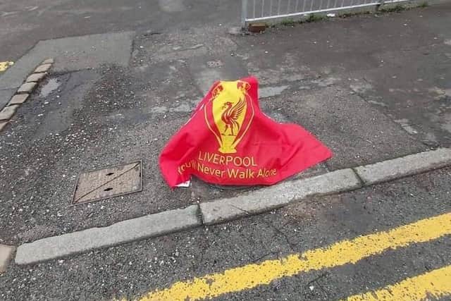 A Liverpool FC flag drape over Bolly