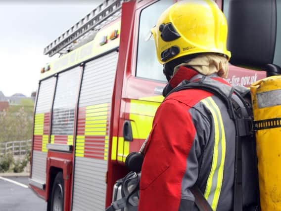 Firefighters are at the scene of a blaze in the Firs Lane area of Leigh