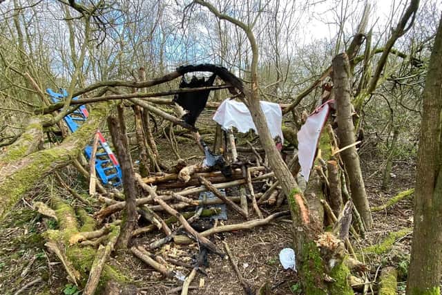 The ramshackle den in the woodland in Lowton