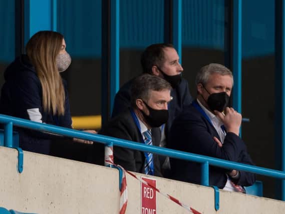 Mal Brannigan (second left) at Gillingham, with Sarah Guilfoyle (club secretary) and board members Richard Bramwell and Tom Markham
