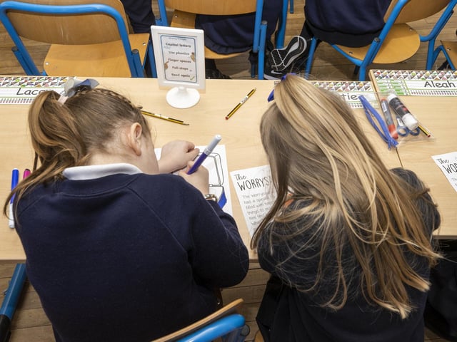 A primary school teacher has been awarded more than £150,000 in compensation