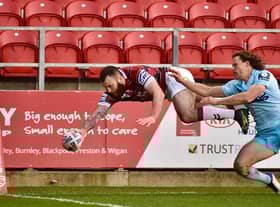 Jake Bibby flies over