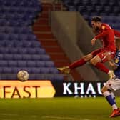 Gwion Edwards makes it 5-0 with a clinical finish from close range
