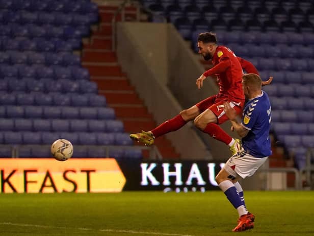 Gwion Edwards makes it 5-0 with a clinical finish from close range