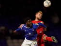 Jack Whatmough wins the ball at Oldham