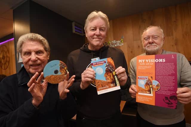 Steve Almond, centre, pictured with musician Mike Gannon, left, who has made music to go with the book, and Haydn Ferguson