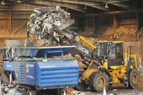 Staff kept busy at Wigan's Kirkless recycling centre