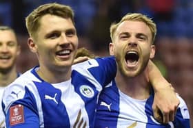 Jack Whatmough celebrates scoring Latics' second goal