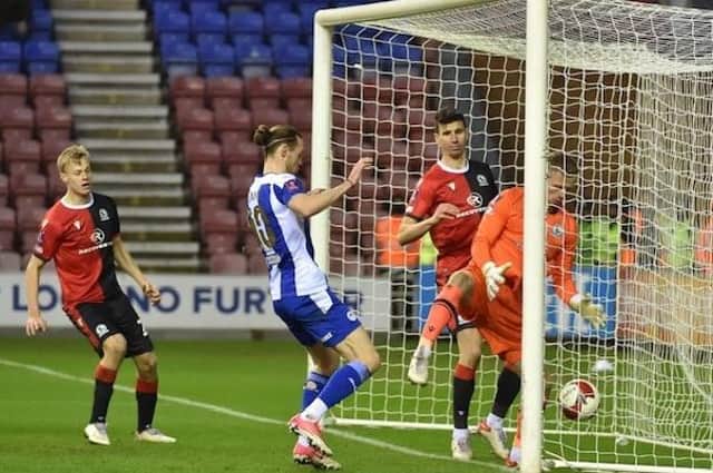 Blackburn goalkeeper Aynsley Pears can't keep out Jack Whatmough's header