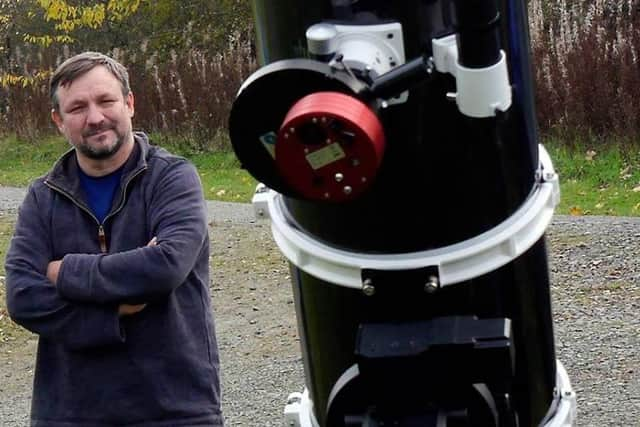 Robert Ince with his telescope