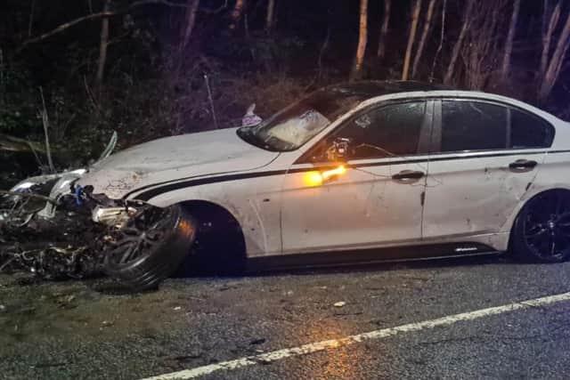 The wrecked BMW back on its wheels