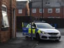 Police at the scene of the Eckersley Street blaze