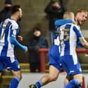 Stephen Humphrys celebrates his late winner at Morecambe