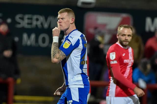 James McClean shushes the Morecambe fans