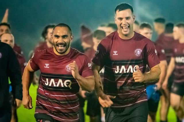 Thomas Leuluai, with Iain Thornley