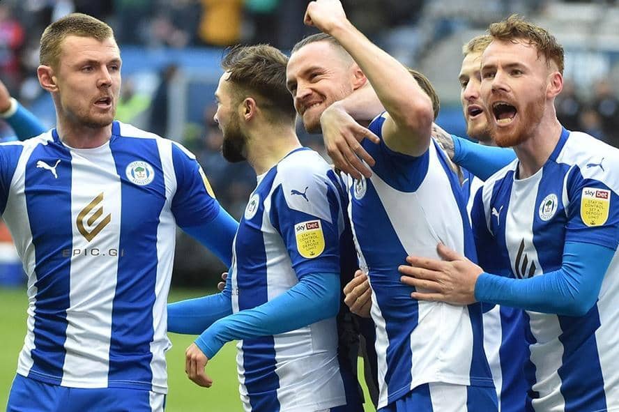 Will Keane gets the congratulations from his colleagues