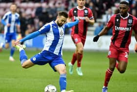 Gwion Edwards in action against Gillingham