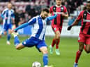 Gwion Edwards in action against Gillingham