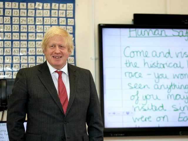 Prime Minister Boris Johnson joining a socially distanced lesson during a visit to Bovingdon Primary School in Hertfordshire on June 19, 2020. Boris Johnson was facing fresh allegations of breaking coronavirus rules after it emerged a gathering to wish him a happy birthday was held inside No 10 during the first lockdown