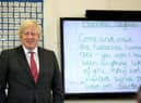 Prime Minister Boris Johnson joining a socially distanced lesson during a visit to Bovingdon Primary School in Hertfordshire on June 19, 2020. Boris Johnson was facing fresh allegations of breaking coronavirus rules after it emerged a gathering to wish him a happy birthday was held inside No 10 during the first lockdown