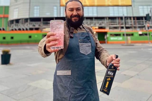 TJ Littlejohn, brand ambassador for Johnnie Walker Whisky, and his cocktail the Cranachan Milk Punch Highball. Picture courtesy of TJ Littlejohn