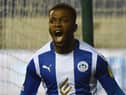 Divin Baningime celebrates his late winner for Latics