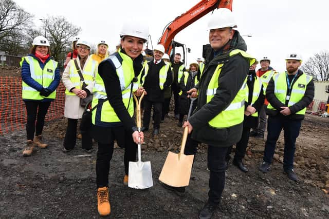 Rachel Beverley-Stevenson chief executive of One Medical Group, left, with Dr Van Spelde partner at Aspull health centre join representatives of One Medical Group, Castlehouse Construction, Wigan Council and members of the community.