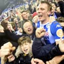 Dan Burn celebrates Latics' famous FA Cup victory over Manchester City in 2018