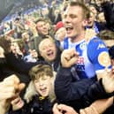 Dan Burn celebrates Latics' famous FA Cup victory over Manchester City in 2018