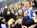 Dan Burn celebrates Latics' famous FA Cup victory over Manchester City in 2018
