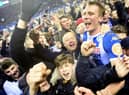 Dan Burn celebrates Latics' famous FA Cup victory over Manchester City in 2018