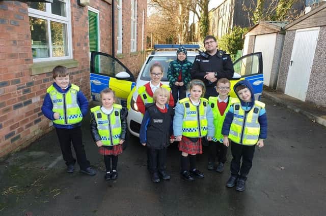 PCSO  Andrew Critchley with some of the children