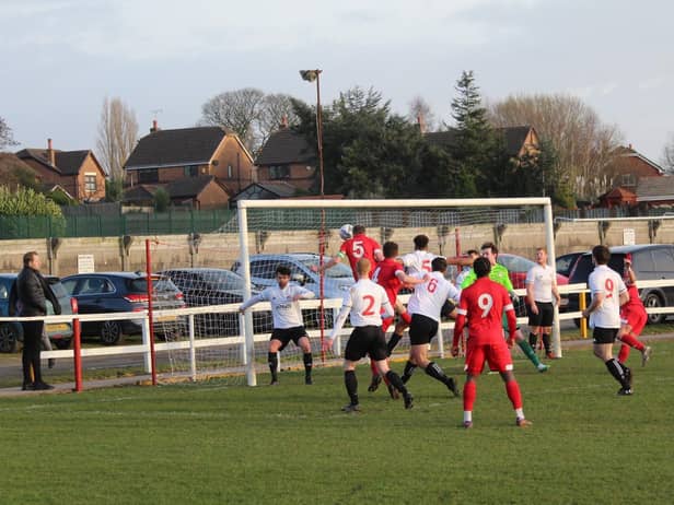 Alex Noonon heads home for Ashton Town (Pic: Gordon Johnson)