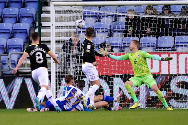 Ben Amos can't prevent Matty Taylor putting Oxford United ahead