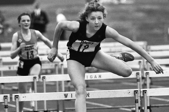 Wigan Harriers Susan Jones shows her style in the 75 metres hurdles Under 20s event in the Northern Counties Championships at Robin Park on Sunday 26th of May 1991.