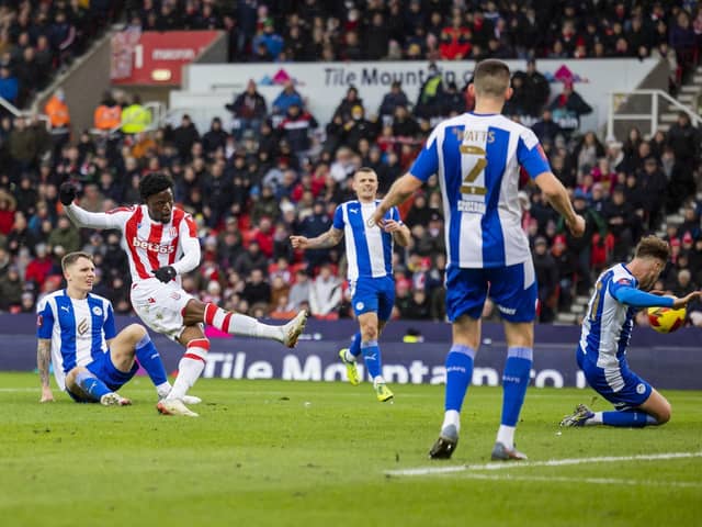 Josh Maja takes advantage of Jason Kerr's slip to put Stoke ahead