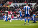 Josh Maja takes advantage of Jason Kerr's slip to put Stoke ahead