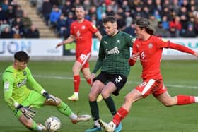 Thelo Aasgaard, setting up Will Keane's goal at Plymouth