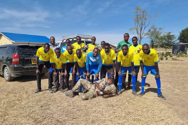 The Kenyan kids show off their new yellow kit!