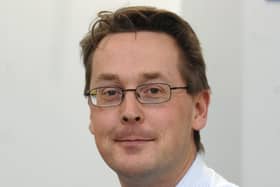 Dr Tim Dalton